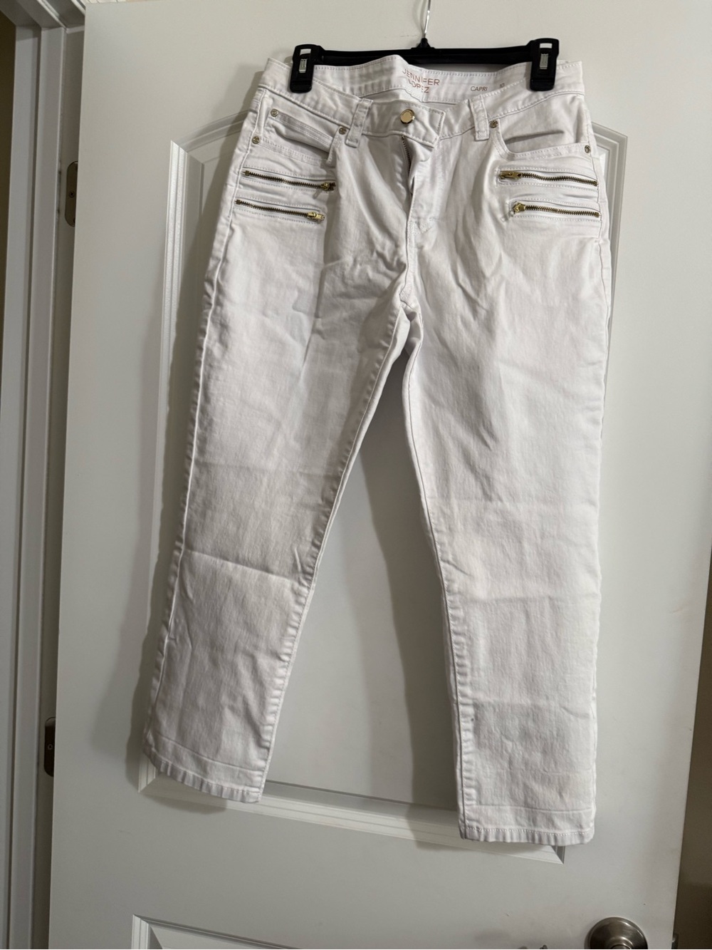Jennifer Lopez White Slim Jeans with Gold Zip Accents
